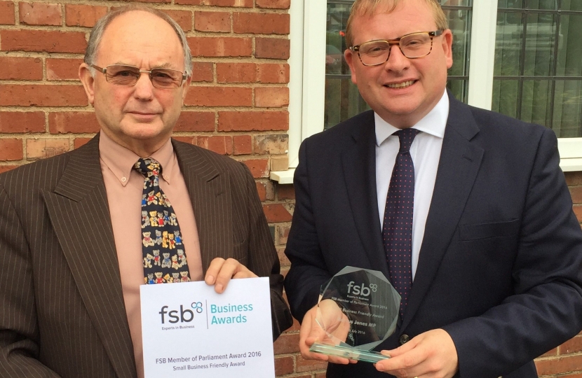 Marcus Jones accepting the award from the FSB