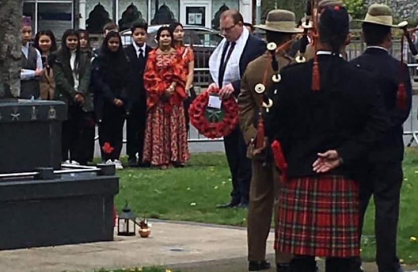 Marcus laying a wreath at the Nuneaton Gurkha memorial